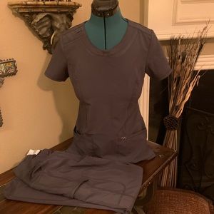 A set of grey scrubs by Cherokee Infinity